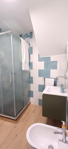 a bathroom with a shower and a sink at Casa XX Settembre Deluxe in Misterbianco