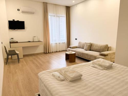 Krevet ili kreveti u jedinici u okviru objekta Imperial Hotel