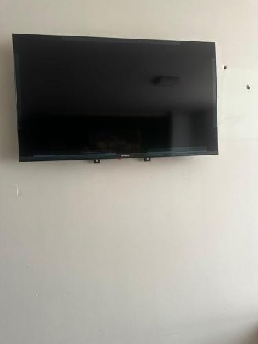 TV i/ili multimedijalni sistem u objektu Cretassic Hostal