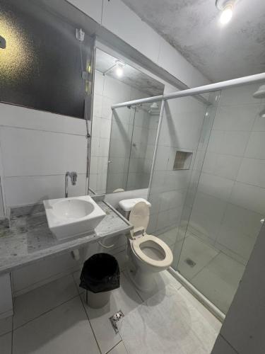 a bathroom with a sink and a toilet and a shower at THE BROTHERS in Angra dos Reis