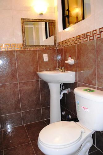 Koupelna v ubytování Hotel Caluva