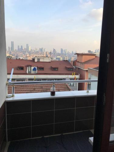 a balcony with a view of a city skyline at Nefes Evleri in Istanbul