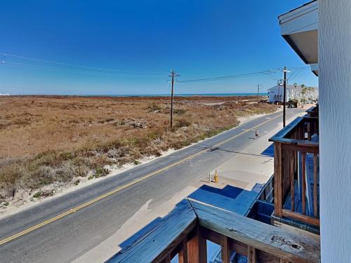 an empty road in the middle of the desert at Hammonds Reef in Padre Island