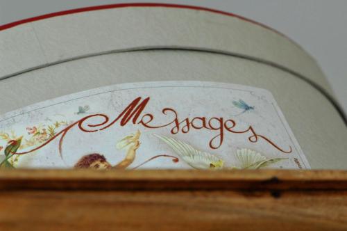 a book with the words all sage written on it at Auberge de la Gare in Grandvaux