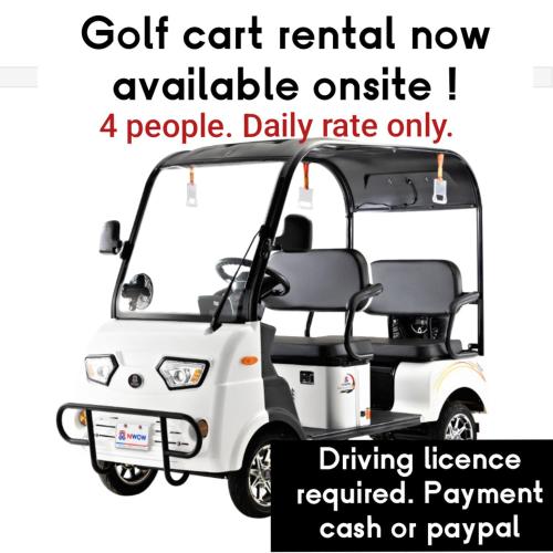 a golf cart rental now available outside people at On-the-beach JADE's BEACH VILLA 별장 Lapu-lapu Olango 별장 in Lapu Lapu City