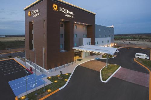 a rendering of a hotel with a skate ramp in a parking lot at La Quinta by Wyndham Aguascalientes in Aguascalientes