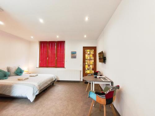 Llit o llits en una habitació de Les Gîtes KARMA