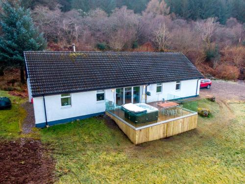 an aerial view of a house with a deck at Glenachulish Bay with Hot Tub in Glencoe