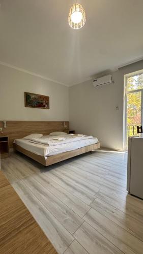 เตียงในห้องที่ Hotel Giorgi