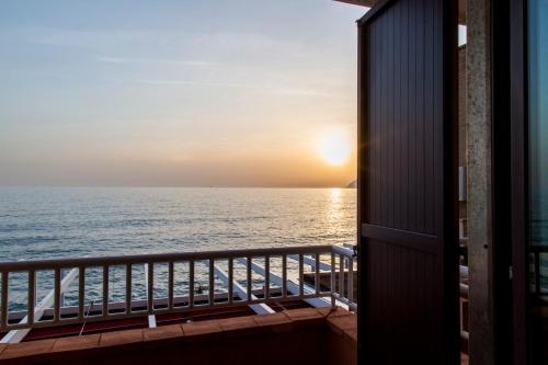 a view of the ocean from the balcony of a cruise ship at Hotel Centro Congressi Polo Nautico in Salerno