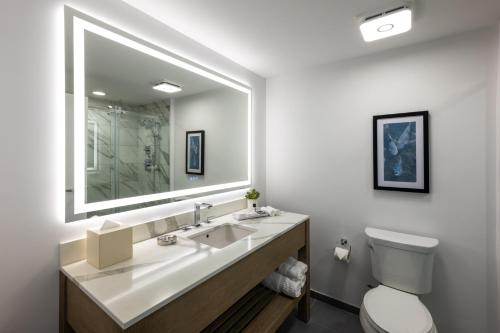 a bathroom with a sink and a toilet at Miccosukee Casino & Resort in Miami