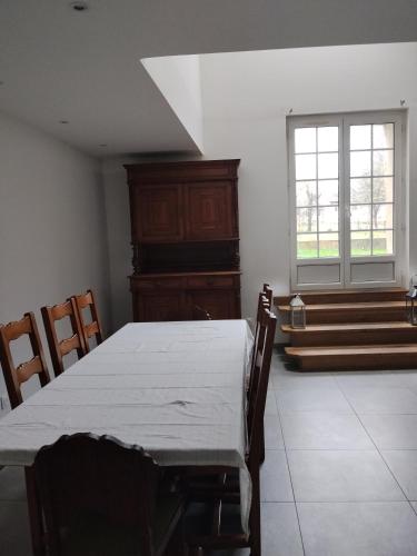 Llit o llits en una habitació de Maison Cyril