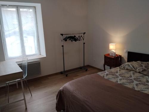 Llit o llits en una habitació de Maison Cyril