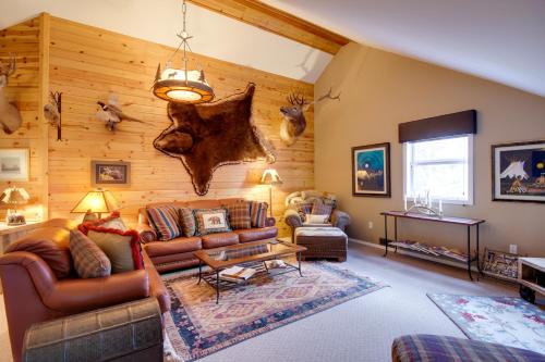 a living room with a couch and a table at Boulder Dreams! Mtn-View Gem in McLeod in McLeod