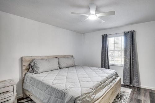 a bedroom with a bed and a ceiling fan at Sun, Sand & Poolside Relaxation! Ormond Beach Unit in Ormond Beach