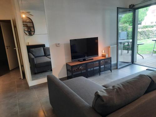 Appartement 67 m2 avec 100 m2 jardin privatif RESERVABLE UNIQUEMENT PAR PERIODE DE 7 JOURS MINIMUM DU SAMEDI AU SAMEDI