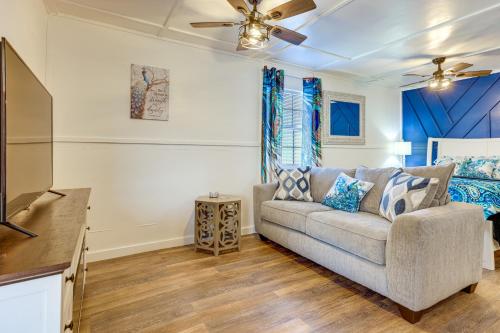 a living room with a couch and a flat screen tv at Pet-Friendly Canyon Lake Studio Fish, Boat, Relax in Canyon Lake