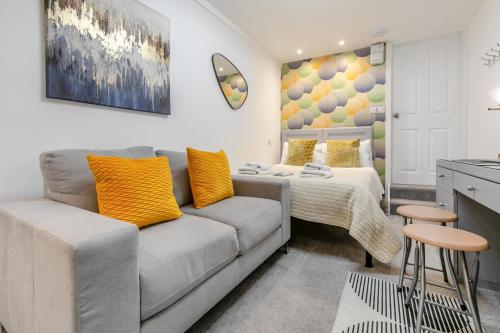 a living room with a couch and a bed at 1 Bed in Penzance oc-u34132 in Penzance