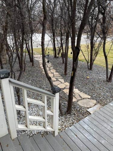 a white fence next to a bunch of trees at Lehi East Bench Private Apt! in Lehi