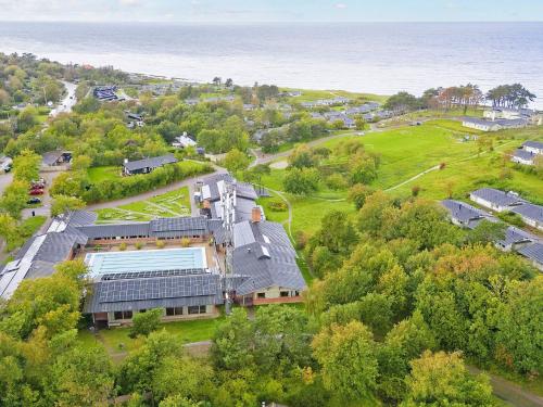 an aerial view of a house with the ocean at Premium room on a holiday park in Gilleleje in Gilleleje