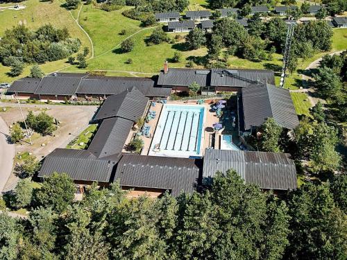 an overhead view of a building with a swimming pool at Premium room on a holiday park in Gilleleje in Gilleleje
