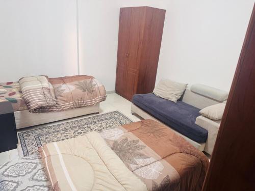 Llit o llits en una habitació de Double Room shared bathroom