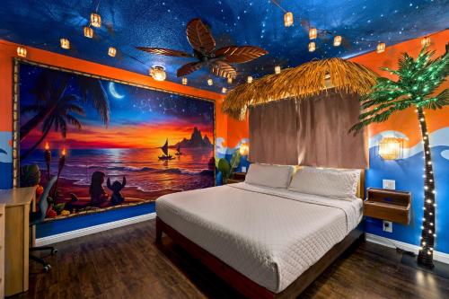 a bedroom with a painting of the ocean at Galaxy Quest by OC Adventure Homes in Garden Grove