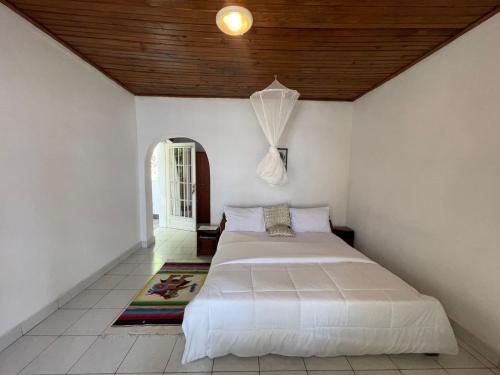Postel nebo postele na pokoji v ubytování La Bella Resort