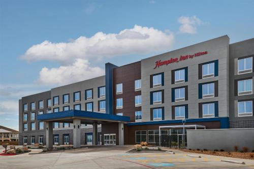 a large building with a hospital at Hampton Inn Midland West in Midland