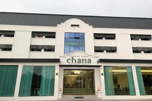 a white building with a china sign on it at Chana Bangkok Hotel in Bangkok