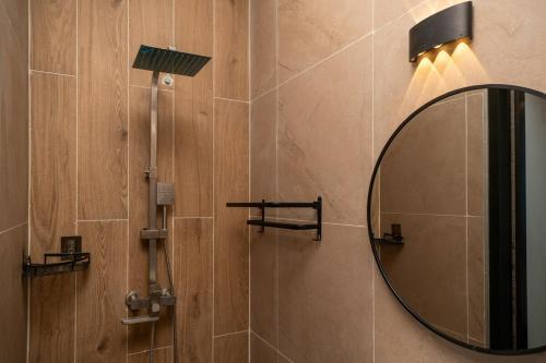 a bathroom with a mirror and a shower at v26 Sunset Dreams - Seaview in Haad Yao in Haad Yao