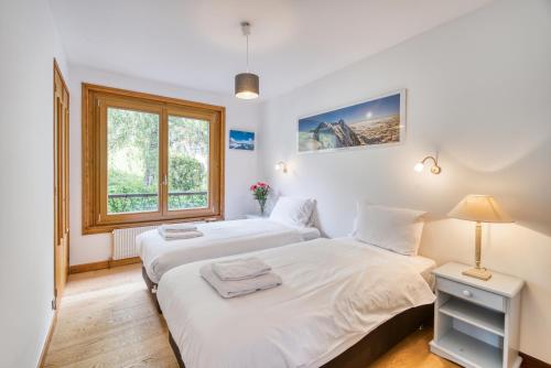 Llit o llits en una habitació de Aran Apartment - Chamonix