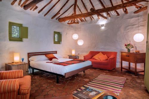 Een bed of bedden in een kamer bij Casa Barichara del Campo