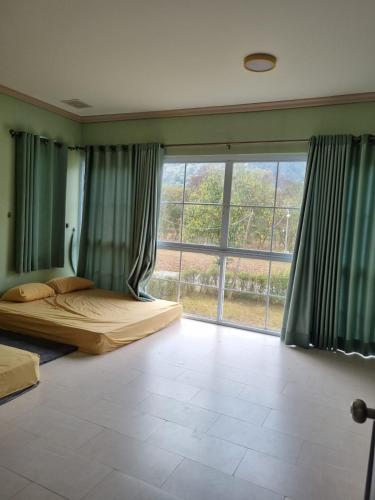 Llit o llits en una habitació de Mountain view villa