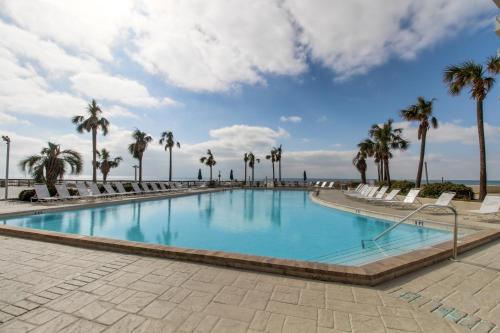 Bright waterfront condo in a gated resort with pools tennis courts & gym photo 3