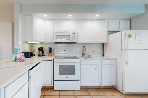 Condo with beach access resort pools & relaxing balcony photo 9