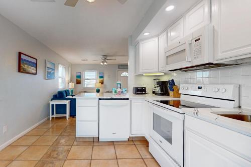 Condo with beach access resort pools & relaxing balcony photo 10