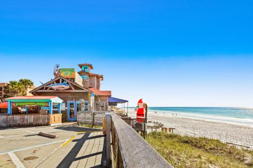 Condo with beach access resort pools & relaxing balcony photo 24