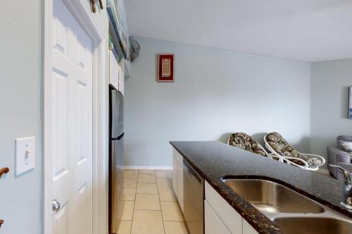 Charming Coastal Getaway with a Private Balcony - Short Drive to Dining photo 13