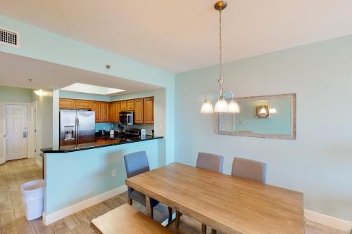 Well-equipped & located seventh-floor condo with balcony shared gym pool & more photo 12