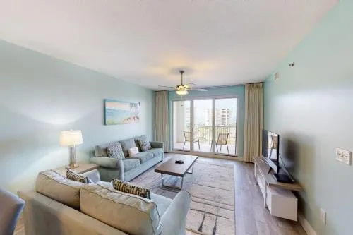 Well-equipped & located seventh-floor condo with balcony shared gym pool & more photo 1