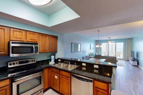 Well-equipped & located seventh-floor condo with balcony shared gym pool & more photo 4
