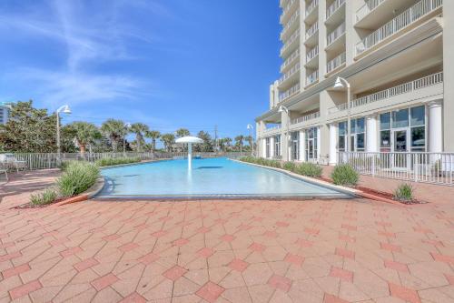 Well-equipped & located seventh-floor condo with balcony shared gym pool & more photo 32