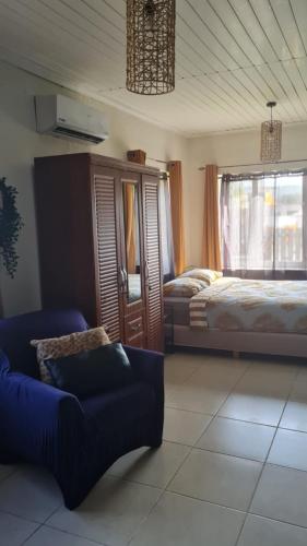 Llit o llits en una habitació de Savaneta house