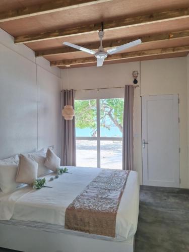 Llit o llits en una habitació de Thundi Ocean View