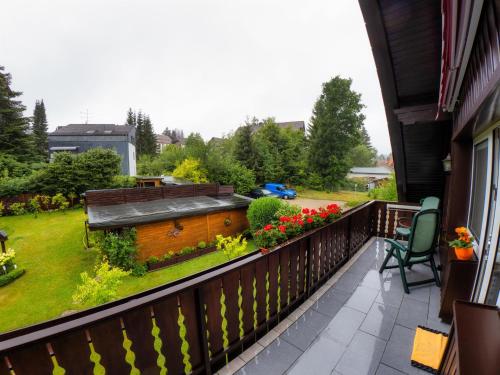 a balcony with a view of a yard at Ferienwohnungen Anders in Braunlage