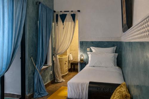 Llit o llits en una habitació de Riad Lapis-lazuli
