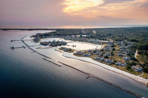 an aerial view of a resort on the water at Beach Resort Punt West in Ouddorp
