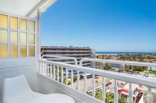 a balcony with a view of the beach at Gold By Marina - Adults only in Playa del Ingles