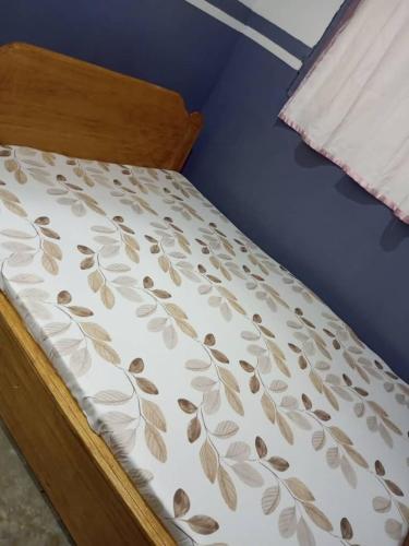 Llit o llits en una habitació de HÔTEL AMANI - Kikwit